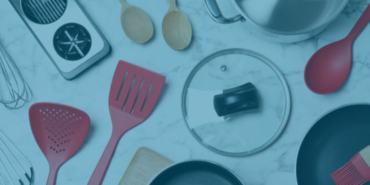 Various kitchen utensils on a counter top