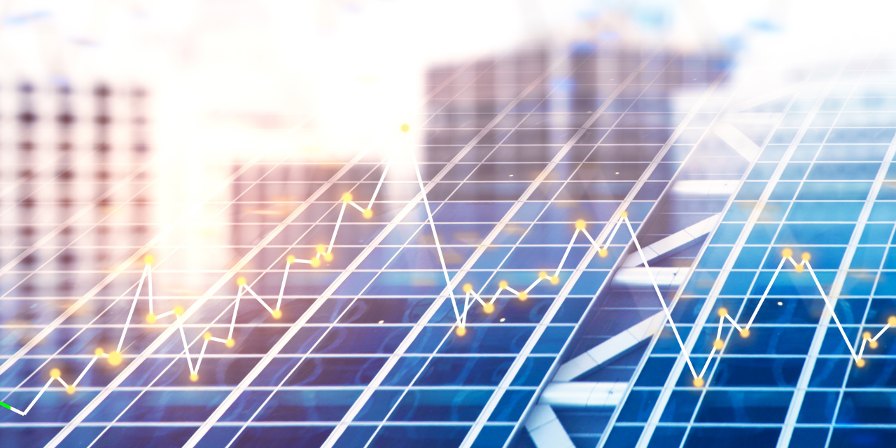 Solar panels with a line graph overlay showing data trends, with buildings and sunlight in the background.