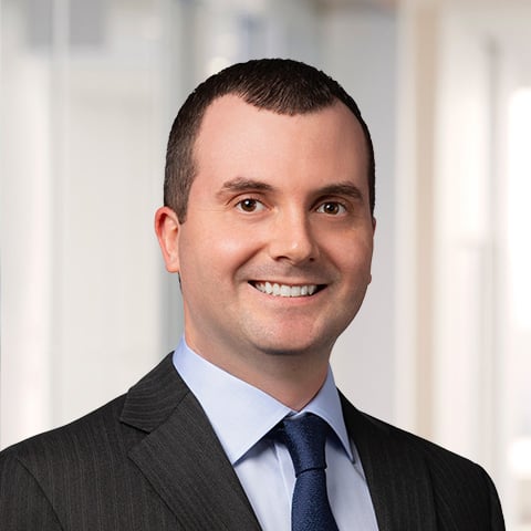 Professional headshot of Lee Lenker