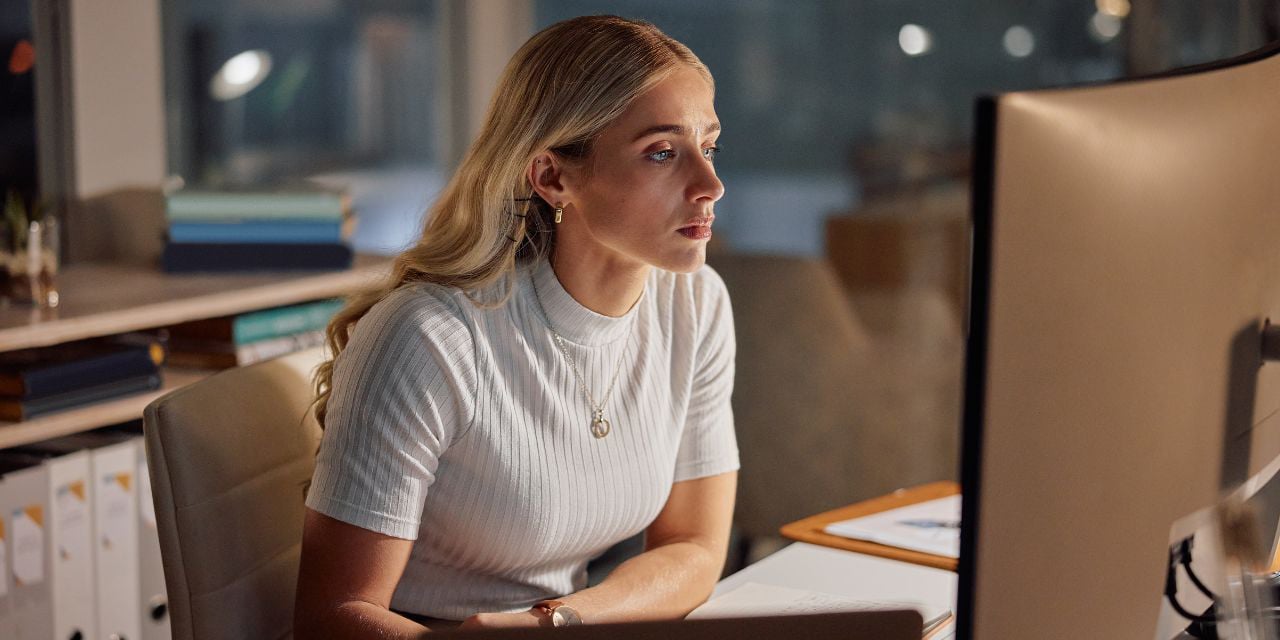 Woman looking at computer